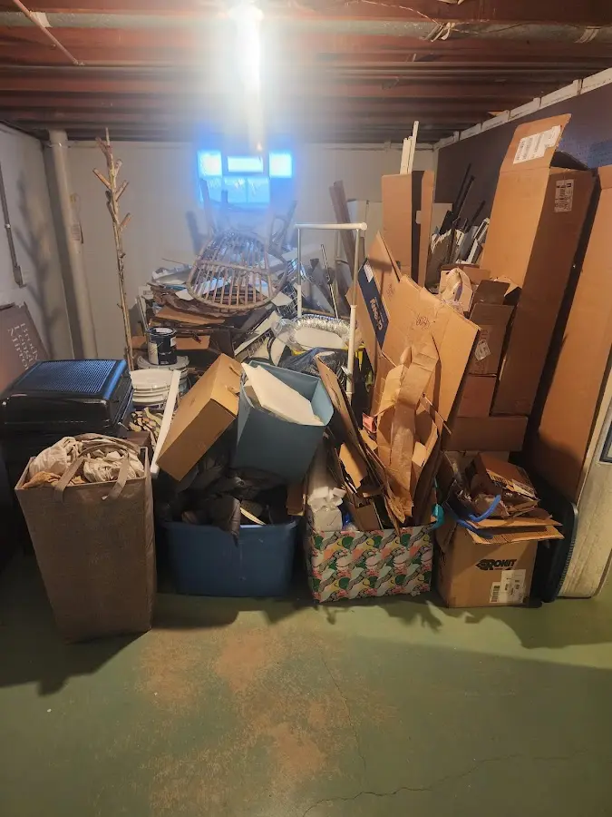 Roll-off dumpster container at job site for Yard Waste Dumpster Rental in Vernon